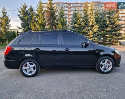 Черный Шкода Фабия, объемом двигателя 1.4 л и пробегом 225 тыс. км за 8600 $, фото 7 на Automoto.ua