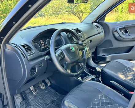 Шкода Фабия 2012 в Кривом Роге на Automoto.ua Черный Шкода Фабия, объемом двигателя 1.2 л и пробегом 266 тыс. км за 5600 $, фото 12 на Automoto.ua