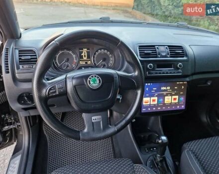 Черный Шкода Фабия, объемом двигателя 1.4 л и пробегом 225 тыс. км за 8600 $, фото 22 на Automoto.ua