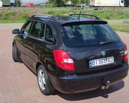 Черный Шкода Фабия, объемом двигателя 1.6 л и пробегом 210 тыс. км за 6700 $, фото 6 на Automoto.ua