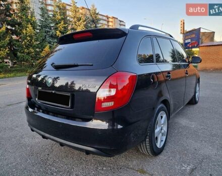 Черный Шкода Фабия, объемом двигателя 1.4 л и пробегом 225 тыс. км за 8600 $, фото 6 на Automoto.ua