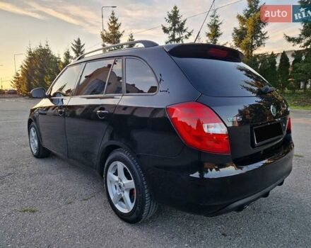 Черный Шкода Фабия, объемом двигателя 1.4 л и пробегом 225 тыс. км за 8600 $, фото 10 на Automoto.ua