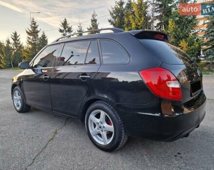 Черный Шкода Фабия, объемом двигателя 1.4 л и пробегом 225 тыс. км за 8600 $, фото 11 на Automoto.ua