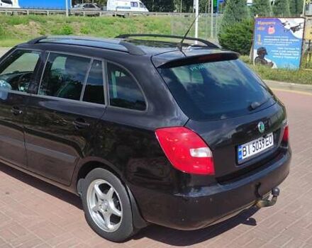 Шкода Фабия 2012 в Полтаве на Automoto.ua Черный Шкода Фабия, объемом двигателя 1.6 л и пробегом 211 тыс. км за 6500 $, фото 5 на Automoto.ua