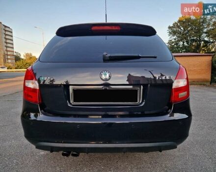 Черный Шкода Фабия, объемом двигателя 1.4 л и пробегом 225 тыс. км за 8600 $, фото 5 на Automoto.ua