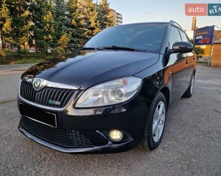 Черный Шкода Фабия, объемом двигателя 1.4 л и пробегом 225 тыс. км за 8600 $, фото 17 на Automoto.ua