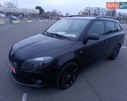 Черный Шкода Фабия, объемом двигателя 1.4 л и пробегом 203 тыс. км за 10500 $, фото 1 на Automoto.ua