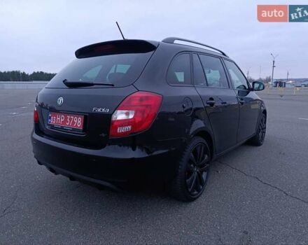 Черный Шкода Фабия, объемом двигателя 1.4 л и пробегом 203 тыс. км за 10500 $, фото 6 на Automoto.ua