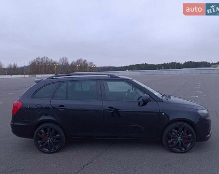 Черный Шкода Фабия, объемом двигателя 1.4 л и пробегом 203 тыс. км за 10500 $, фото 4 на Automoto.ua