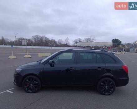 Черный Шкода Фабия, объемом двигателя 1.4 л и пробегом 203 тыс. км за 10500 $, фото 5 на Automoto.ua