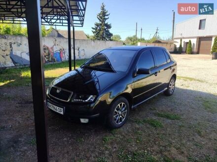 Черный Шкода Фабия, объемом двигателя 1.4 л и пробегом 290 тыс. км за 4500 $, фото 1 на Automoto.ua
