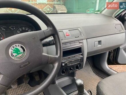 Черный Шкода Фабия, объемом двигателя 1.39 л и пробегом 278 тыс. км за 4200 $, фото 1 на Automoto.ua