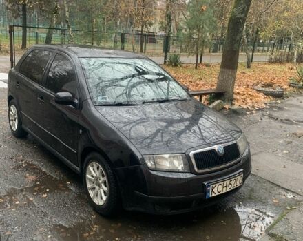 Черный Шкода Фабия, объемом двигателя 1.4 л и пробегом 210 тыс. км за 1600 $, фото 1 на Automoto.ua