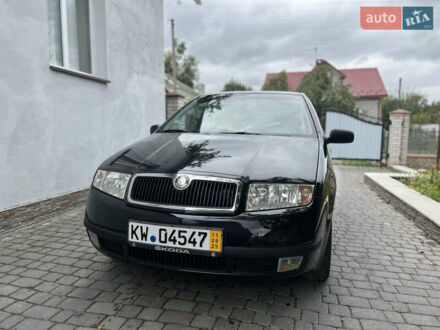 Черный Шкода Фабия, объемом двигателя 1.39 л и пробегом 174 тыс. км за 4999 $, фото 1 на Automoto.ua