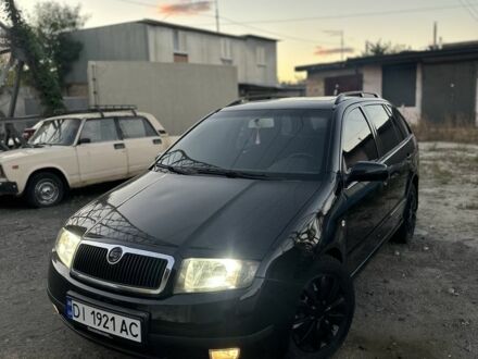 Черный Шкода Фабия, объемом двигателя 1.4 л и пробегом 290 тыс. км за 4400 $, фото 1 на Automoto.ua