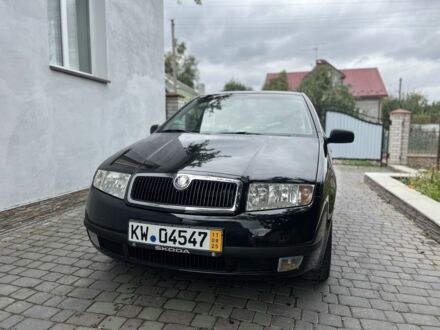 Черный Шкода Фабия, объемом двигателя 1.4 л и пробегом 174 тыс. км за 4899 $, фото 1 на Automoto.ua