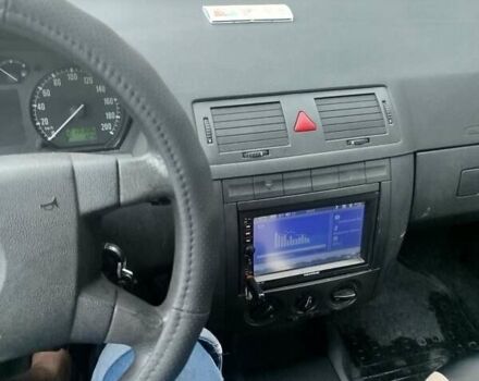 Черный Шкода Фабия, объемом двигателя 1.4 л и пробегом 213 тыс. км за 3999 $, фото 1 на Automoto.ua