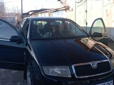 Черный Шкода Фабия, объемом двигателя 1.4 л и пробегом 213 тыс. км за 3900 $, фото 1 на Automoto.ua