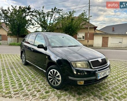 Черный Шкода Фабия, объемом двигателя 1.2 л и пробегом 200 тыс. км за 2250 $, фото 1 на Automoto.ua