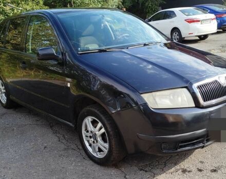 Черный Шкода Фабия, объемом двигателя 1.4 л и пробегом 309 тыс. км за 2900 $, фото 1 на Automoto.ua