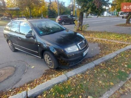 Черный Шкода Фабия, объемом двигателя 1.39 л и пробегом 320 тыс. км за 3899 $, фото 1 на Automoto.ua