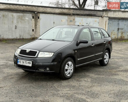Черный Шкода Фабия, объемом двигателя 1.4 л и пробегом 233 тыс. км за 3800 $, фото 1 на Automoto.ua