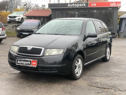 Черный Шкода Фабия, объемом двигателя 1.4 л и пробегом 308 тыс. км за 3390 $, фото 1 на Automoto.ua