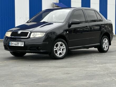 Черный Шкода Фабия, объемом двигателя 1.2 л и пробегом 200 тыс. км за 3100 $, фото 1 на Automoto.ua