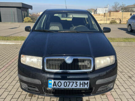 Черный Шкода Фабия, объемом двигателя 1.2 л и пробегом 300 тыс. км за 3500 $, фото 1 на Automoto.ua