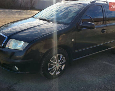 Черный Шкода Фабия, объемом двигателя 1.39 л и пробегом 225 тыс. км за 4300 $, фото 1 на Automoto.ua