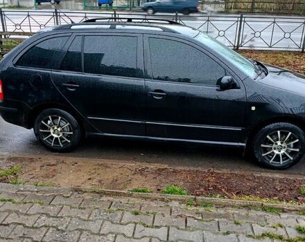 Черный Шкода Фабия, объемом двигателя 1.4 л и пробегом 247 тыс. км за 6000 $, фото 1 на Automoto.ua