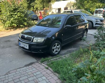 Черный Шкода Фабия, объемом двигателя 1.4 л и пробегом 245 тыс. км за 4500 $, фото 1 на Automoto.ua