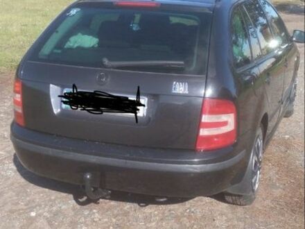 Черный Шкода Фабия, объемом двигателя 1.4 л и пробегом 208 тыс. км за 4000 $, фото 1 на Automoto.ua