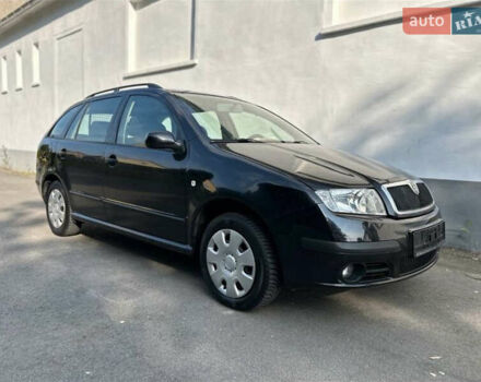Черный Шкода Фабия, объемом двигателя 1.39 л и пробегом 153 тыс. км за 4761 $, фото 1 на Automoto.ua