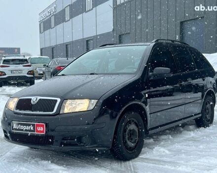 Черный Шкода Фабия, объемом двигателя 1.4 л и пробегом 276 тыс. км за 5440 $, фото 1 на Automoto.ua