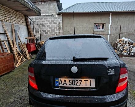 Черный Шкода Фабия, объемом двигателя 1.2 л и пробегом 315 тыс. км за 3300 $, фото 1 на Automoto.ua