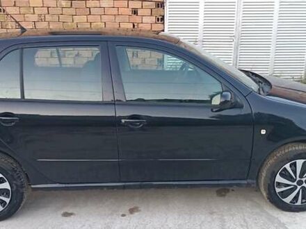 Черный Шкода Фабия, объемом двигателя 1.2 л и пробегом 189 тыс. км за 4054 $, фото 1 на Automoto.ua