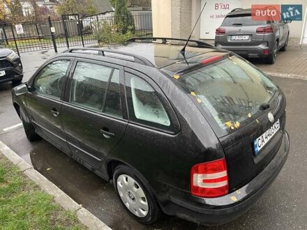 Черный Шкода Фабия, объемом двигателя 1.39 л и пробегом 222 тыс. км за 4550 $, фото 1 на Automoto.ua