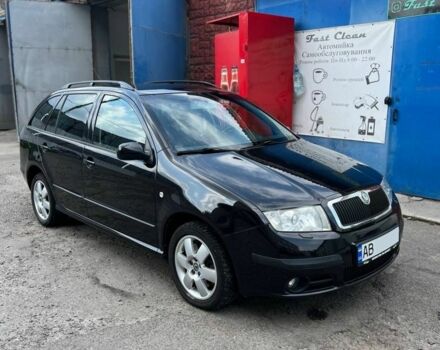 Черный Шкода Фабия, объемом двигателя 2 л и пробегом 201 тыс. км за 5200 $, фото 1 на Automoto.ua