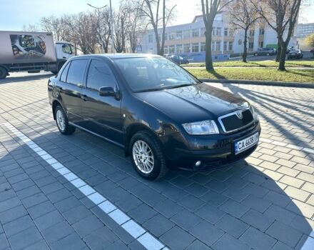 Черный Шкода Фабия, объемом двигателя 1.2 л и пробегом 285 тыс. км за 4200 $, фото 1 на Automoto.ua