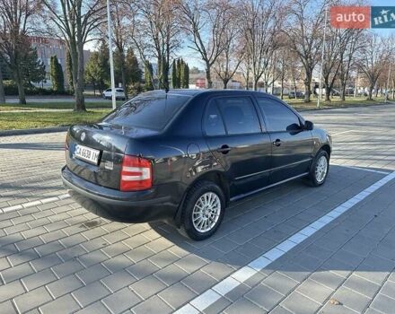 Чорний Шкода Фабія, об'ємом двигуна 1.2 л та пробігом 285 тис. км за 4200 $, фото 1 на Automoto.ua
