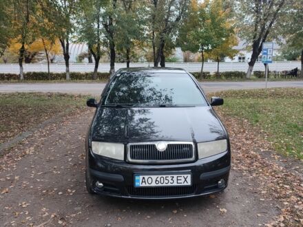 Черный Шкода Фабия, объемом двигателя 1.2 л и пробегом 234 тыс. км за 4200 $, фото 1 на Automoto.ua