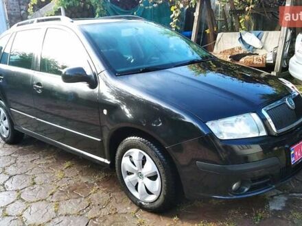 Черный Шкода Фабия, объемом двигателя 1.4 л и пробегом 219 тыс. км за 4699 $, фото 1 на Automoto.ua