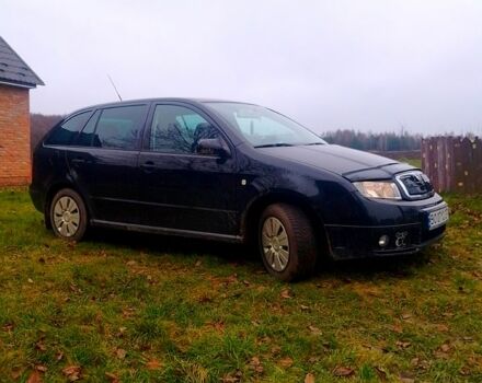 Черный Шкода Фабия, объемом двигателя 1.4 л и пробегом 220 тыс. км за 4444 $, фото 1 на Automoto.ua