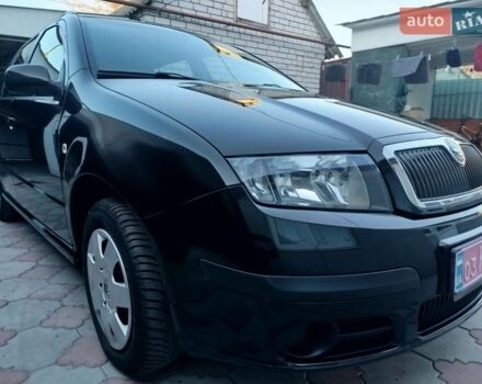 Черный Шкода Фабия, объемом двигателя 1.4 л и пробегом 153 тыс. км за 5350 $, фото 1 на Automoto.ua