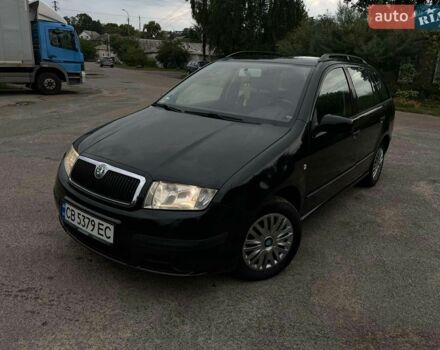 Черный Шкода Фабия, объемом двигателя 1.39 л и пробегом 250 тыс. км за 4950 $, фото 1 на Automoto.ua