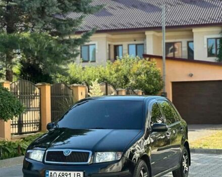Черный Шкода Фабия, объемом двигателя 1.2 л и пробегом 197 тыс. км за 3200 $, фото 1 на Automoto.ua