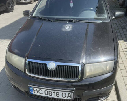 Черный Шкода Фабия, объемом двигателя 1.2 л и пробегом 240 тыс. км за 2400 $, фото 1 на Automoto.ua