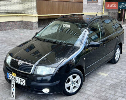 Черный Шкода Фабия, объемом двигателя 1.4 л и пробегом 162 тыс. км за 3999 $, фото 1 на Automoto.ua