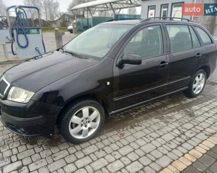 Черный Шкода Фабия, объемом двигателя 1.39 л и пробегом 216 тыс. км за 4500 $, фото 1 на Automoto.ua